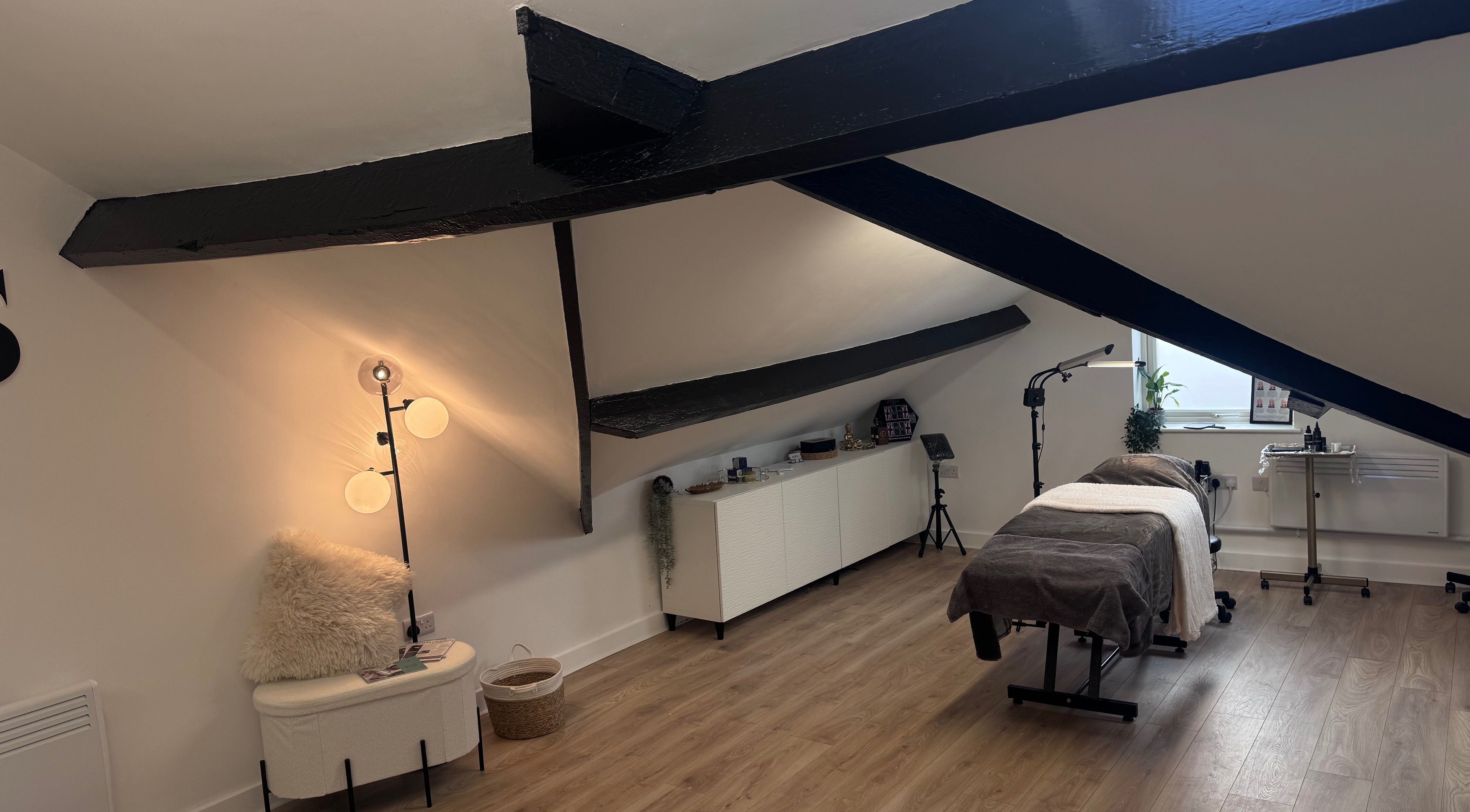 Relaxing treatment room at Kate's Studio, Coalville, England, GB. Elegant and warm ambiance for beauty services.