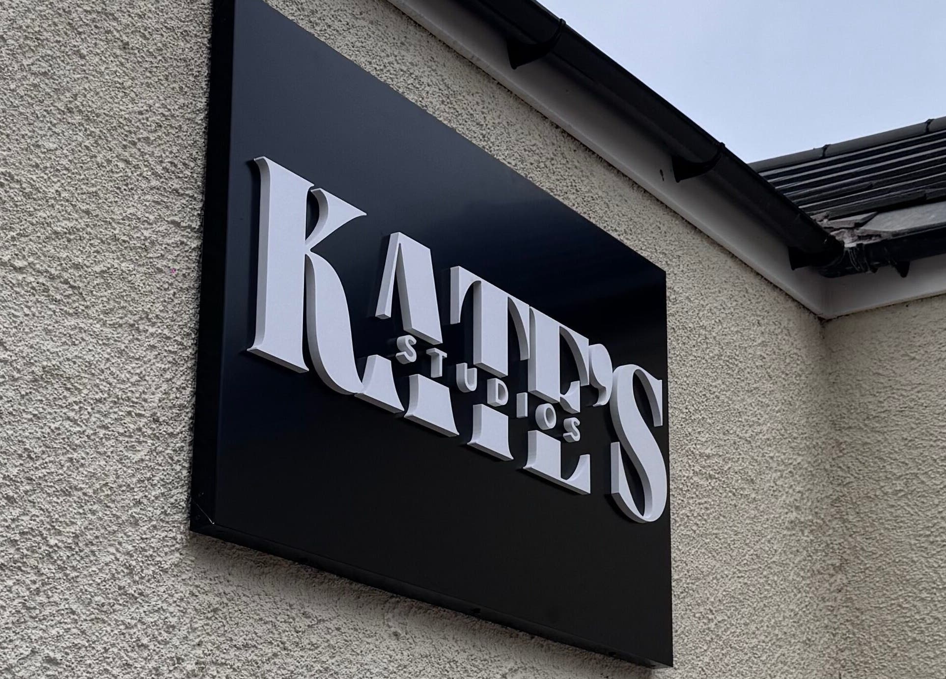 Entrance view of Kate's Studio in Coalville, England, GB, showcasing the modern signboard.