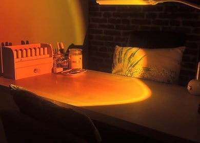 Warmly lit nail station at Ameerah Grace Nails, Lytham Saint Annes, England, GB, featuring organized polish display.