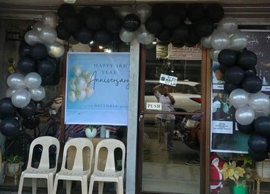 Hair Republic Barber Salon and Spa (Calamba Branch) entrance decorated for an anniversary in Calamba, Calabarzon, PH.