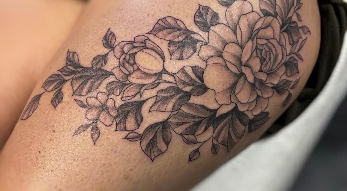 Intricate floral tattoo design at Art by Aimee, Gqeberha, Eastern Cape, ZA, showcasing elegant craftsmanship.