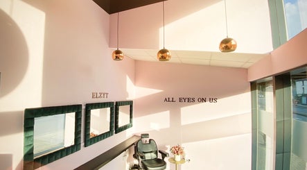 Bright interior of Elzyt Brows by Patricija in Drogheda, County Louth, IE with mirrors and salon chair.