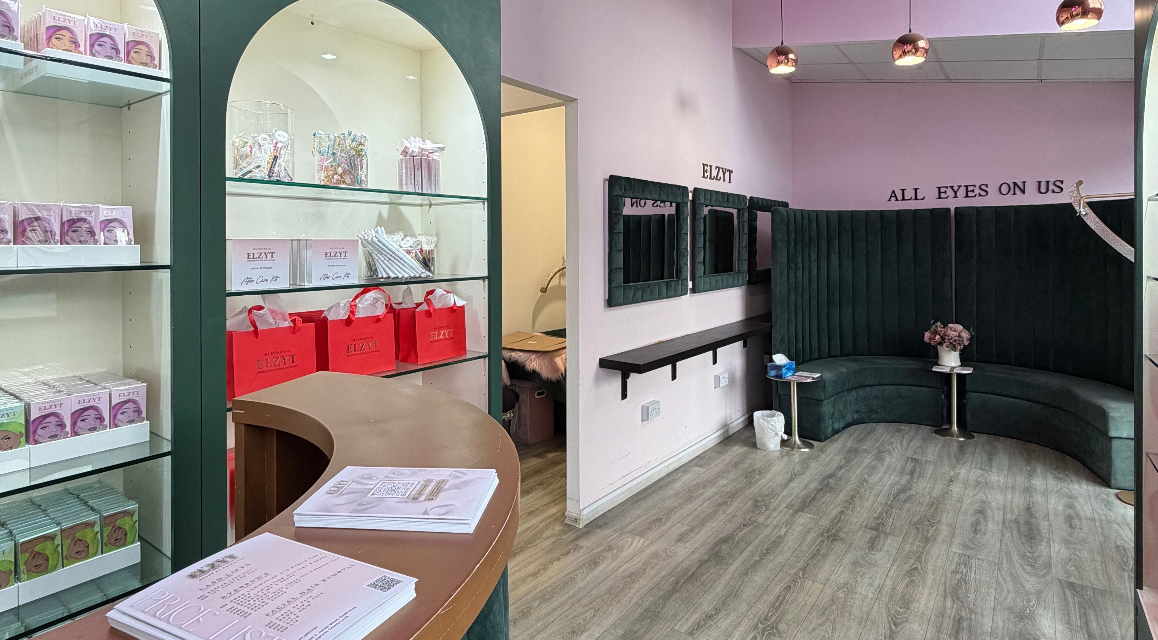 Elzyt Brows by Patricija in Drogheda, County Louth, IE features a stylish waiting area with product displays.