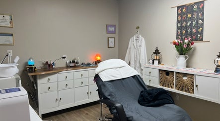 Tranquil treatment room at Youthful Glow Aesthetics, Munford, Tennessee, US with cozy decor and relaxing ambiance.