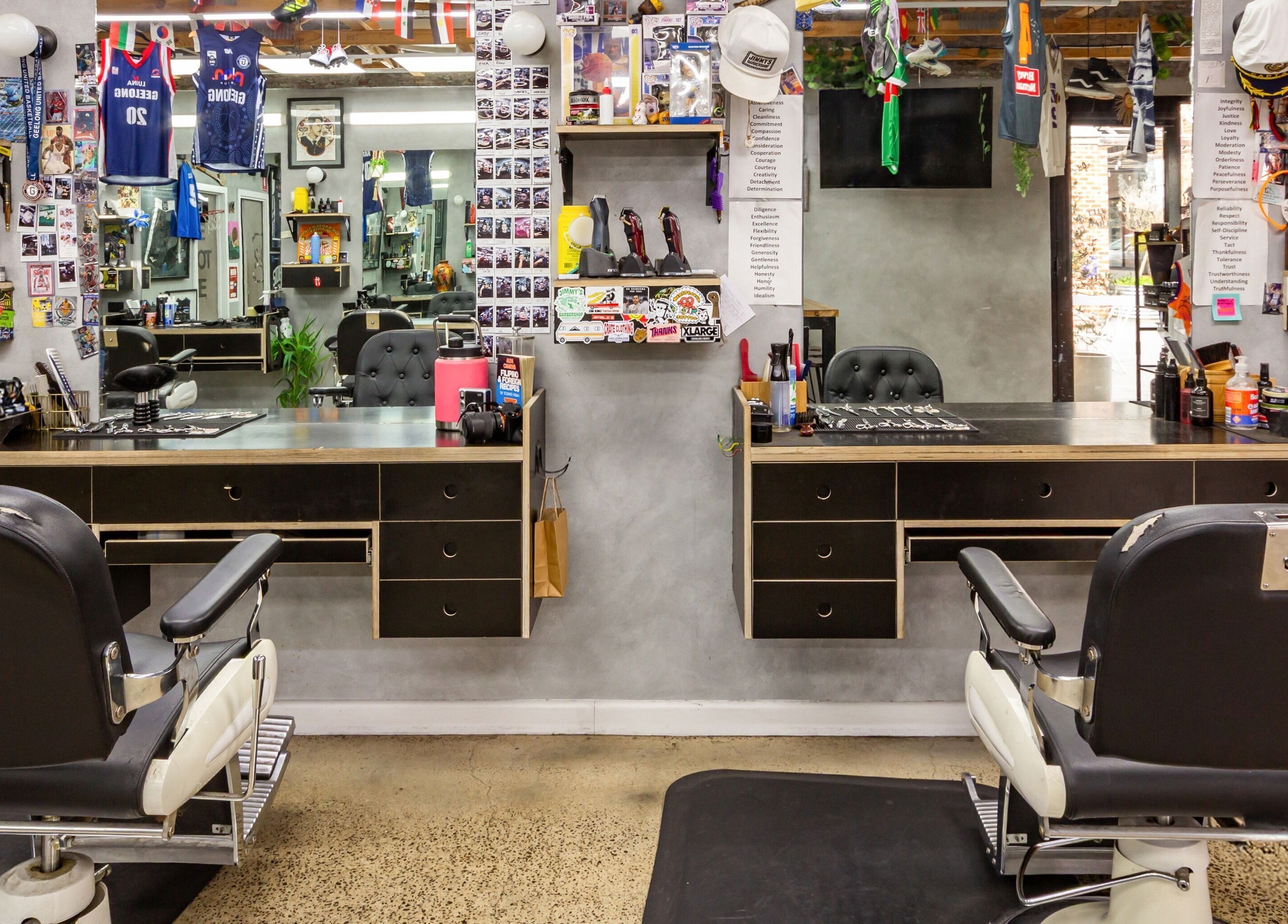 Inside The Streets Barbershop at Geelong West, Victoria, AU, featuring stylish chairs and mirrors with decor.