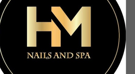 HM Nails & Spa logo in Southfield, Michigan, US, showcasing elegance with gold lettering on a black background.