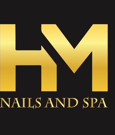 HM Nails & Spa logo in gold and black, located in Southfield, Michigan, US.