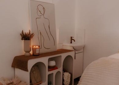 Cozy treatment room at Triple Moon Beauty, Mandurah, Western Australia, AU with minimalistic decor and ambient lighting.