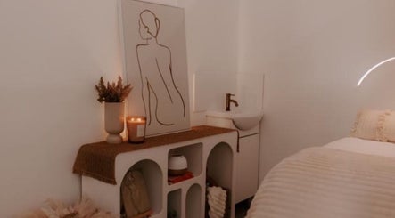 Cozy treatment room at Triple Moon Beauty, Mandurah, Western Australia, AU with minimalistic decor and ambient lighting.