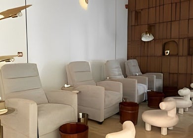 Comfortable lounge chairs at Strand Salon, Riyadh, Riyadh Province, SA with elegant decor.