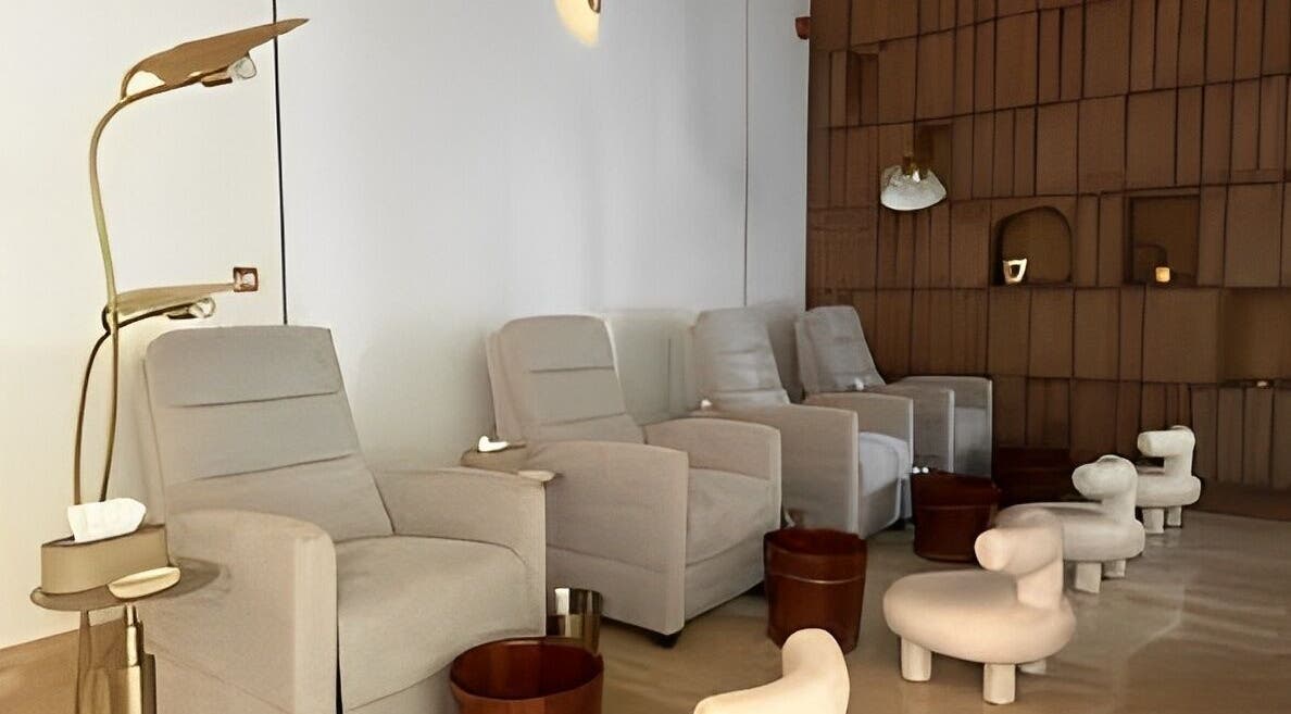 Comfortable lounge chairs at Strand Salon, Riyadh, Riyadh Province, SA with elegant decor.