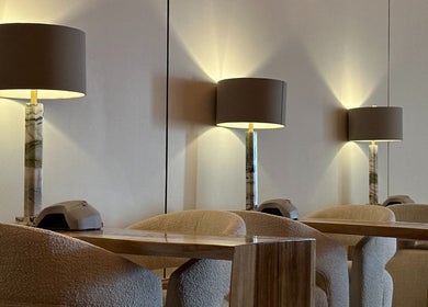 Elegant seating with lamps at Strand Salon, Riyadh, Riyadh Province, SA for a relaxing wellness experience.