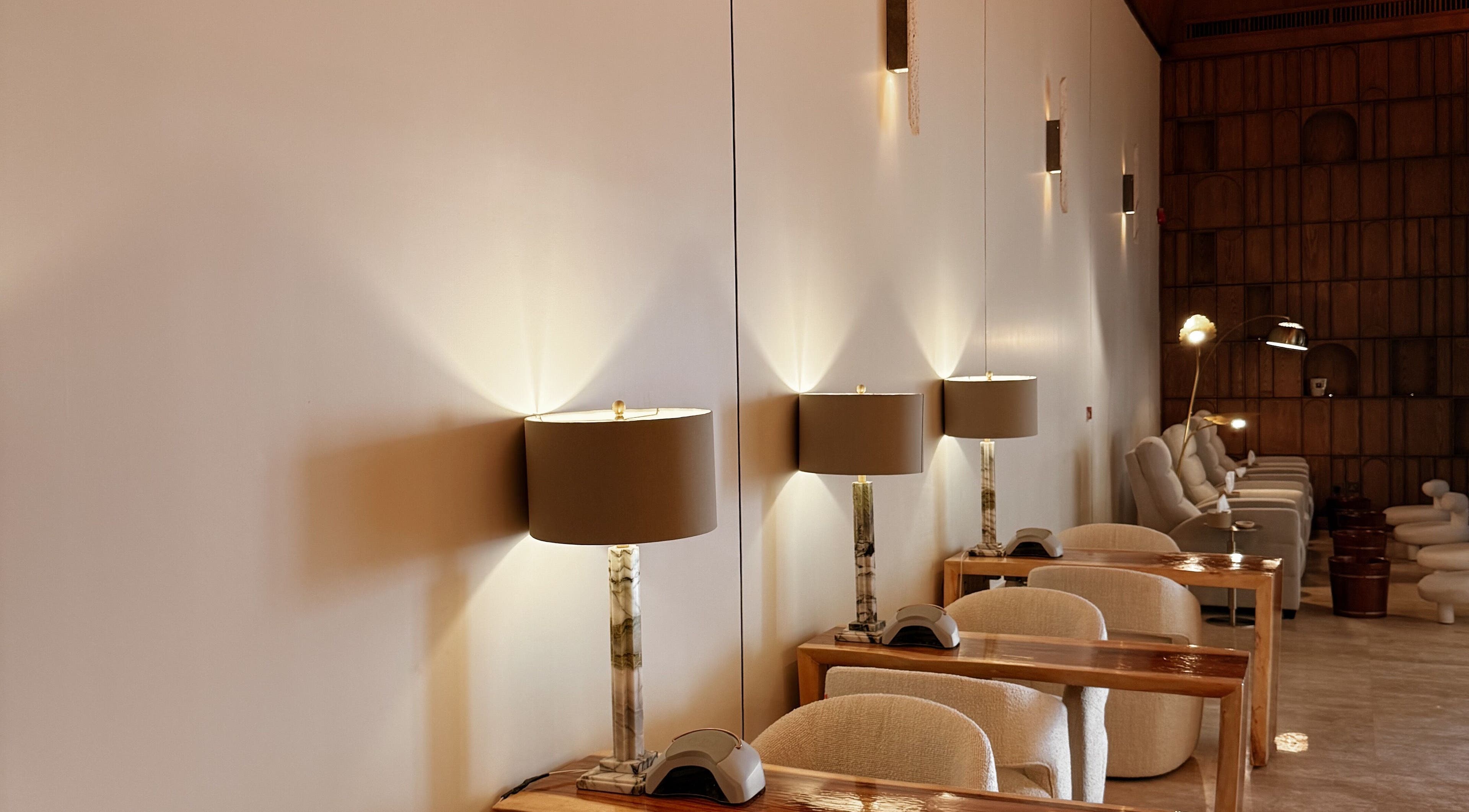 Stylish seating and lighting at Strand Salon, Riyadh, Riyadh Province, SA. A modern beauty retreat.