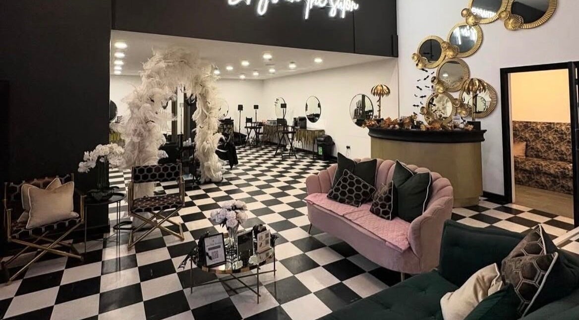 Interior of The Curl Station in Liverpool, England, GB showing stylish seating and elegant decor.