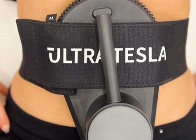 Ultratesla toning belt at Kaizen Clinic, Dublin, County Dublin, IE, for advanced body sculpting.