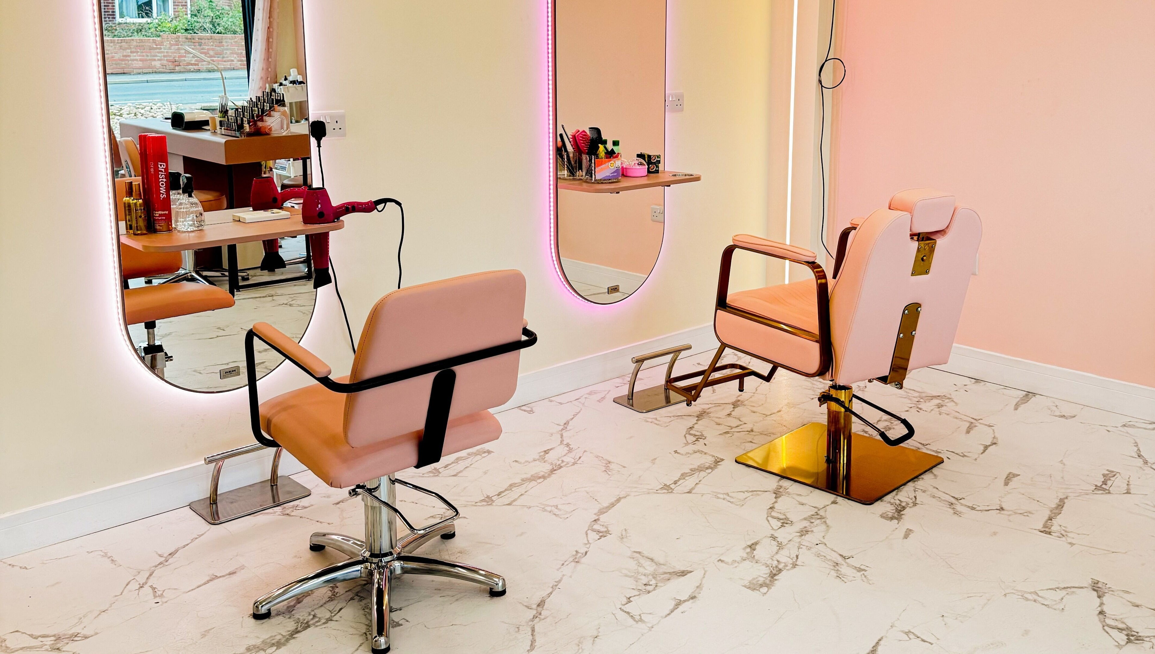 Elegant salon chairs and mirrors at GK Beauty, Maltby, England, GB.