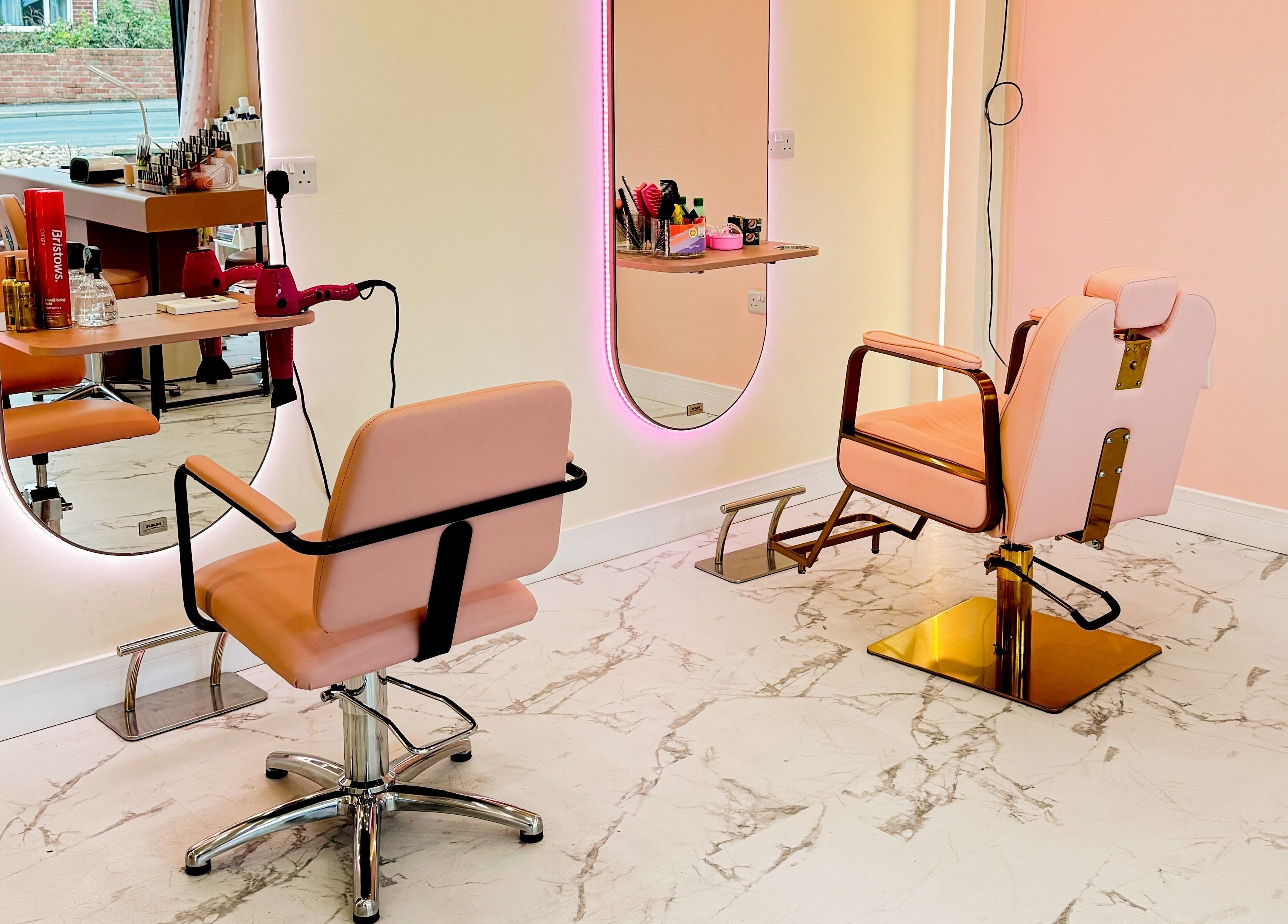 Elegant salon chairs and mirrors at GK Beauty, Maltby, England, GB.