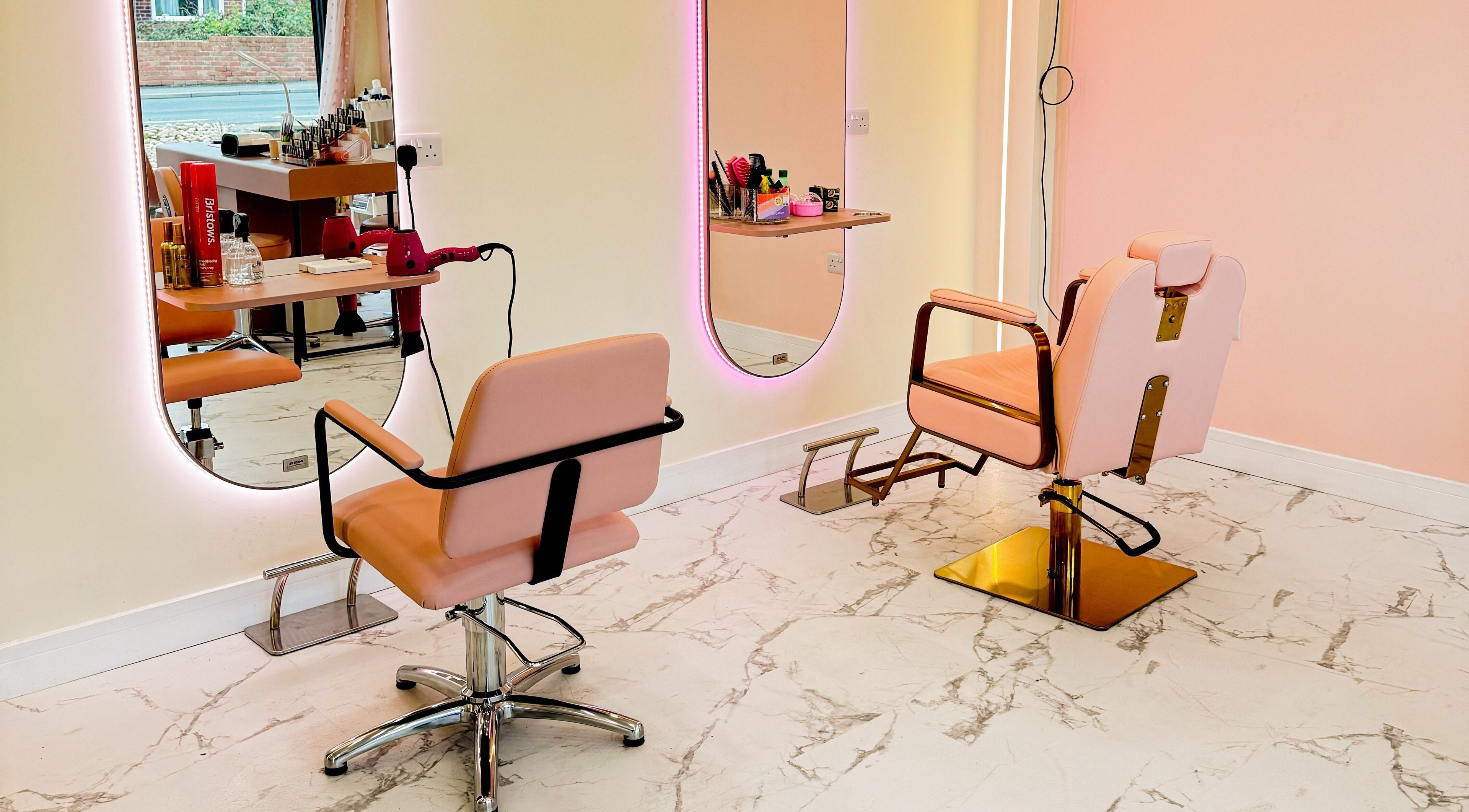 Elegant salon chairs and mirrors at GK Beauty, Maltby, England, GB.