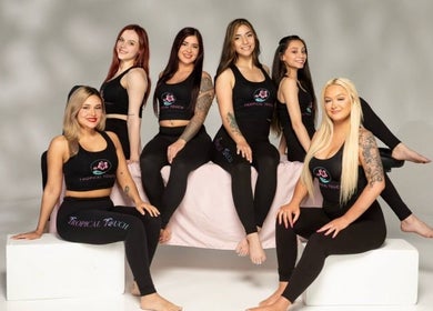 Talented team at Tropical Touch Akron in Akron, Ohio, US showcasing expertise in beauty and wellness.