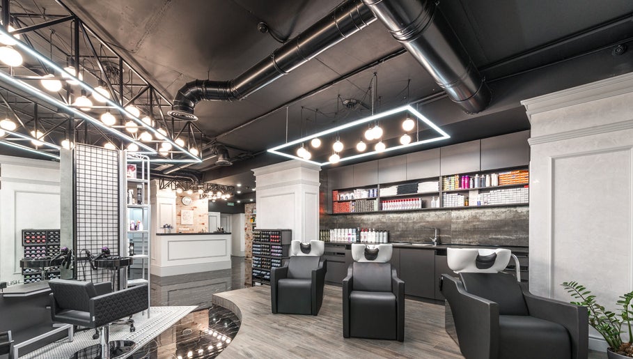 Modern salon interior at Tandi's Curls, Kellyville Ridge, New South Wales, AU, showcasing stylish wash stations.