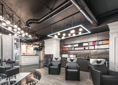 Modern salon interior at Tandi's Curls, Kellyville Ridge, New South Wales, AU, showcasing stylish wash stations.