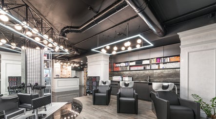 Modern salon interior at Tandi's Curls, Kellyville Ridge, New South Wales, AU, showcasing stylish wash stations.
