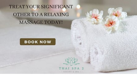 Rolled towels with flowers at Thaispa massage 2 in Las Vegas, Nevada, US, inviting a relaxing experience.