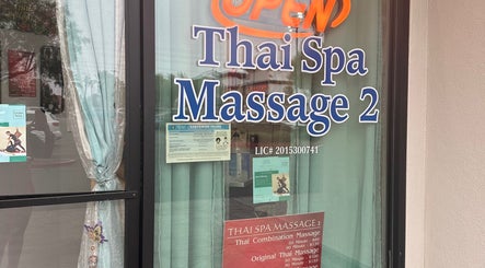 Front window of Thaispa Massage 2, located in Las Vegas, Nevada, US, displaying open sign and services offered.