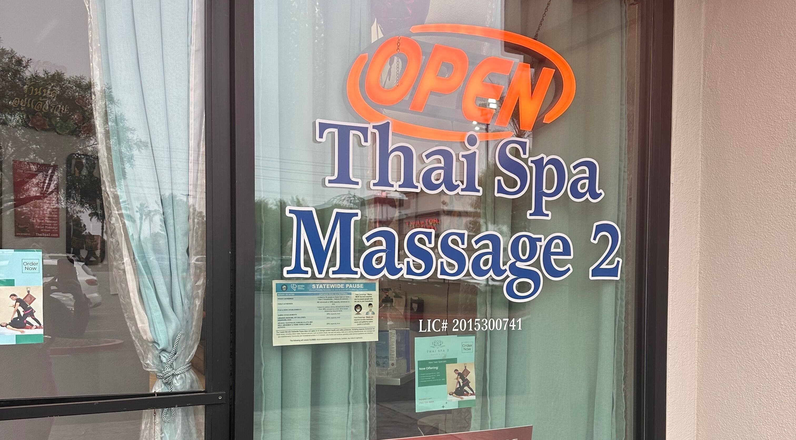 Entrance of Thaispa Massage 2 in Las Vegas, Nevada, US, with an open sign displayed.