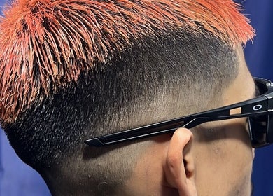 Trendy haircut with vibrant highlights at Aisy’s Cut, Gombak, Selangor, MY, showcasing modern styling.