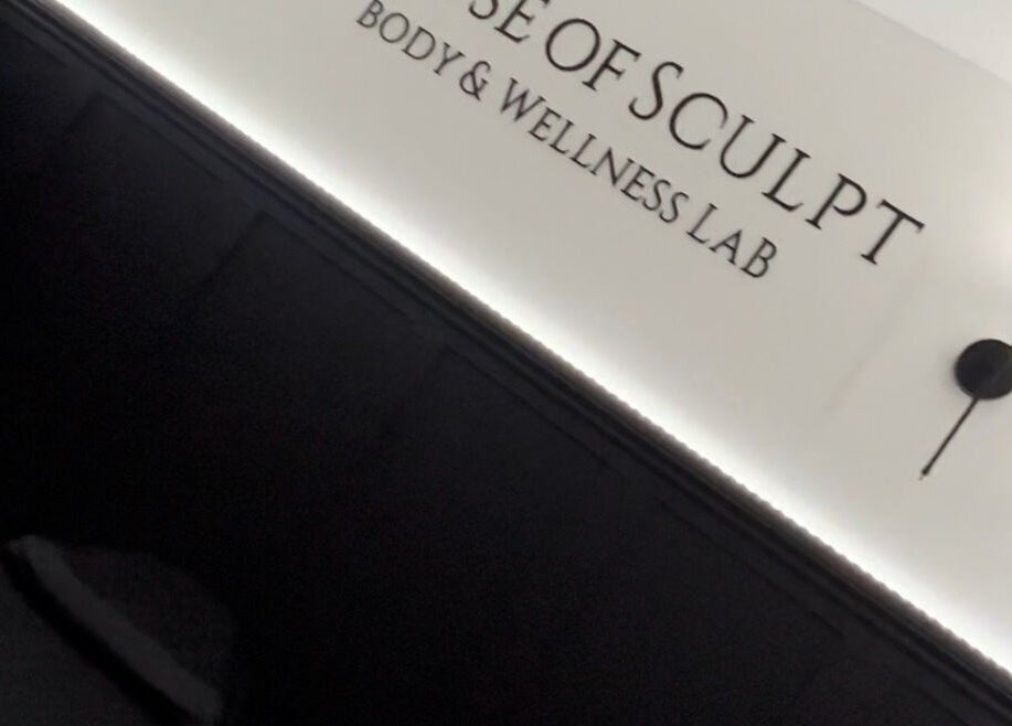 Stylish interior of House Of Sculpt in Featherstone, England, GB with modern wall light and elegant decor.