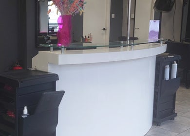 Reception area at Leigh Slattery Hair in Johnstone, Scotland, GB, showcasing stylish modern design.