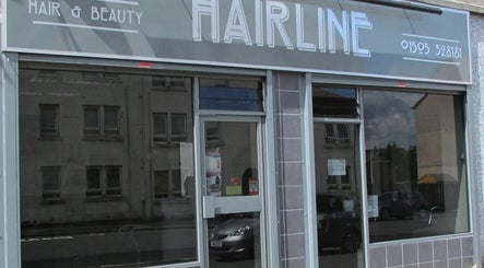 Exterior of Leigh Slattery Hair in Johnstone, Scotland, GB showcasing modern salon design.