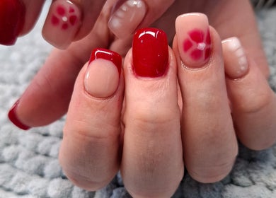 Stylish red and nude nail designs at Urban Nails At Jocelynn, Pretoria, Gauteng, ZA.