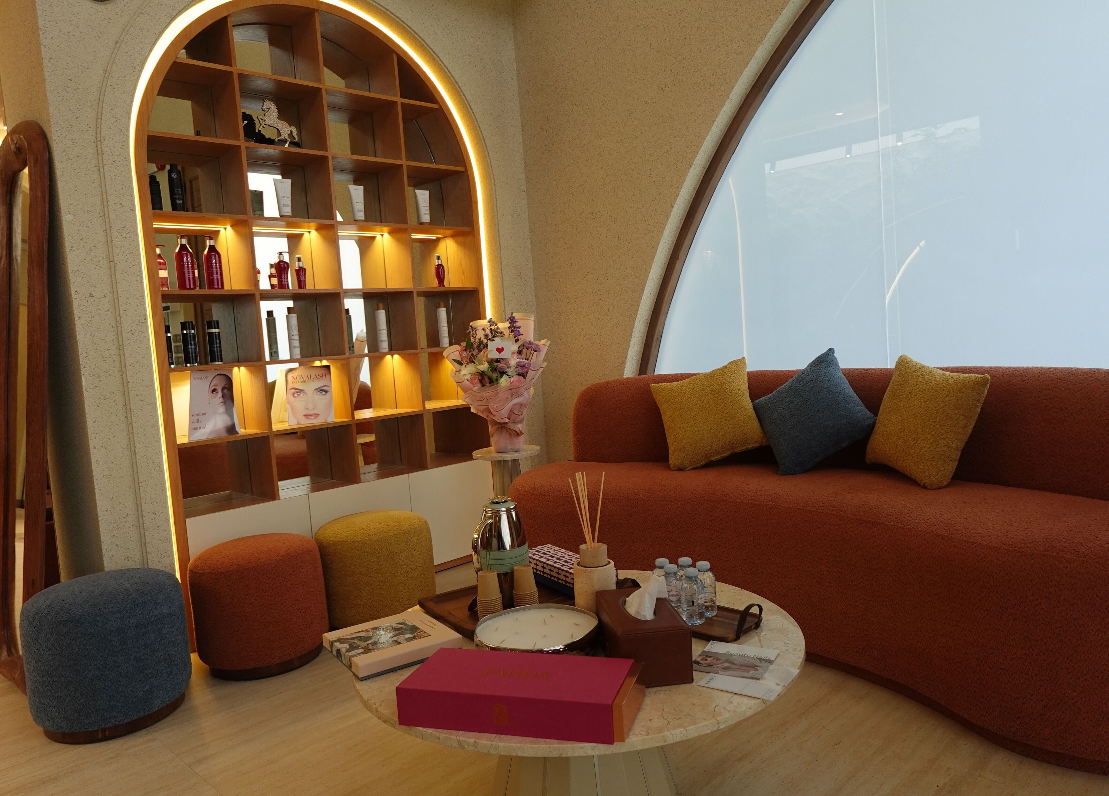 Inviting lounge at Beautiholic salon, Al Khobar, Eastern Province, SA featuring plush seating and decor.