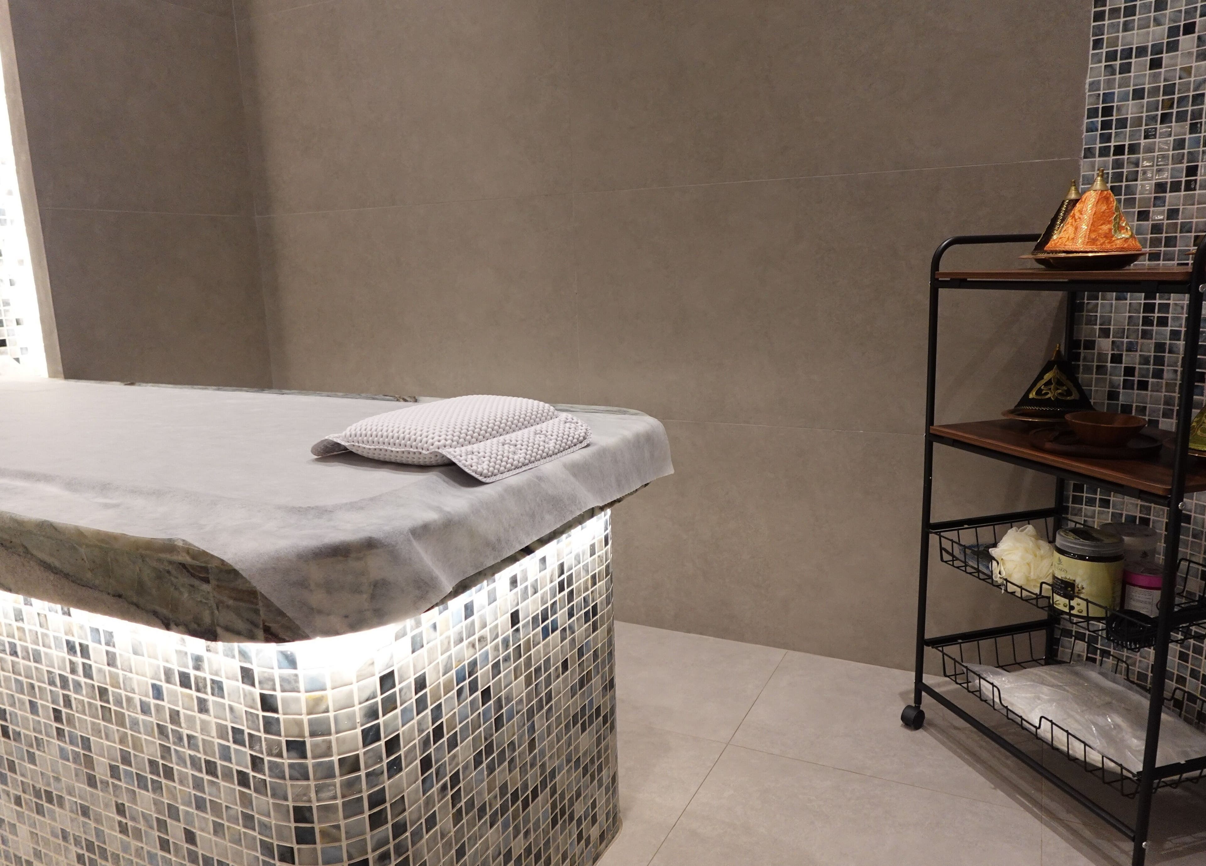 Massage table in the serene room at Beautiholic salon, Al Khobar, Eastern Province, SA.