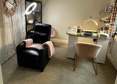 Stylish beauty workstation at Ellies Lash and Nails Studio, Saint Austell, England, GB with plush seating.