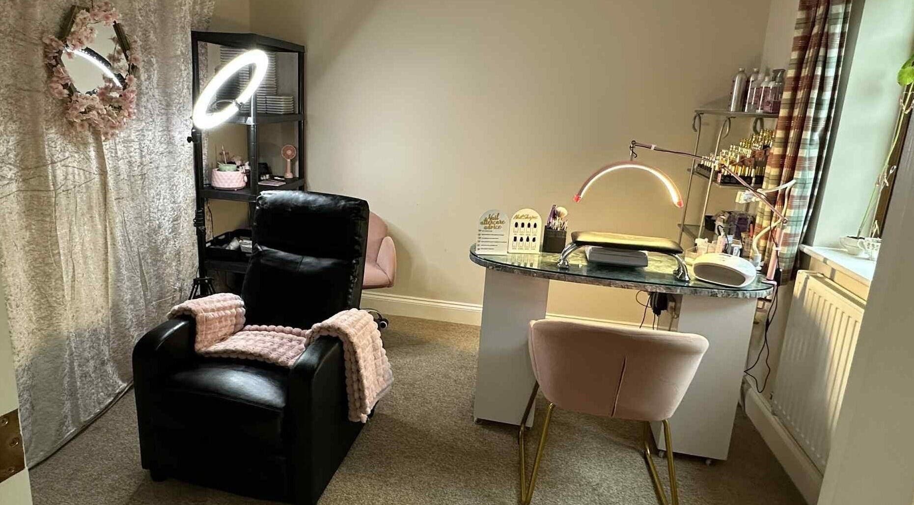 Cozy salon setup at Ellies Lash and Nails at The Beauty Cabin in Saint Austell, England, GB.