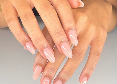 Manicured nails with artistic design at Beauty by Issy T in Redcliffe, Queensland, AU.