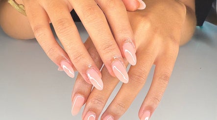 Manicured nails with artistic design at Beauty by Issy T in Redcliffe, Queensland, AU.