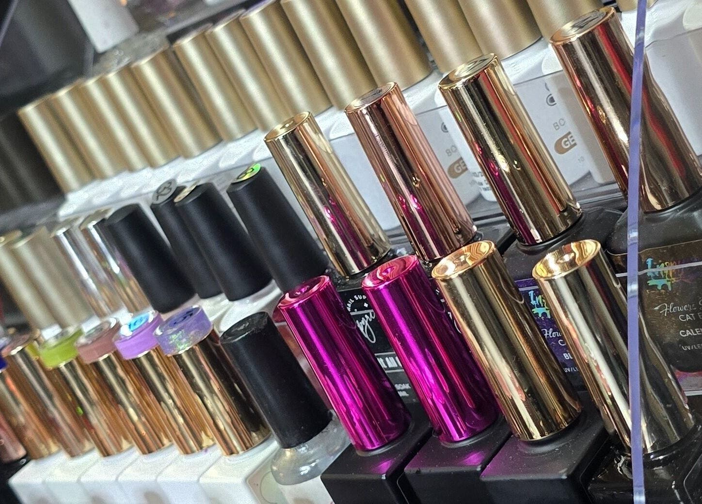 Vibrant nail polish colors at Kassia Nails in Raceview, Queensland, AU, showcasing stylish shades.