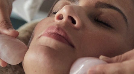 Relaxing crystal facial therapy at Therapy Lodge, Battle, England, GB; enhancing skin rejuvenation and calm.