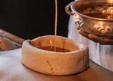 Relaxing oil therapy at Therapy Lodge in Battle, England, GB, promoting relaxation and wellness.