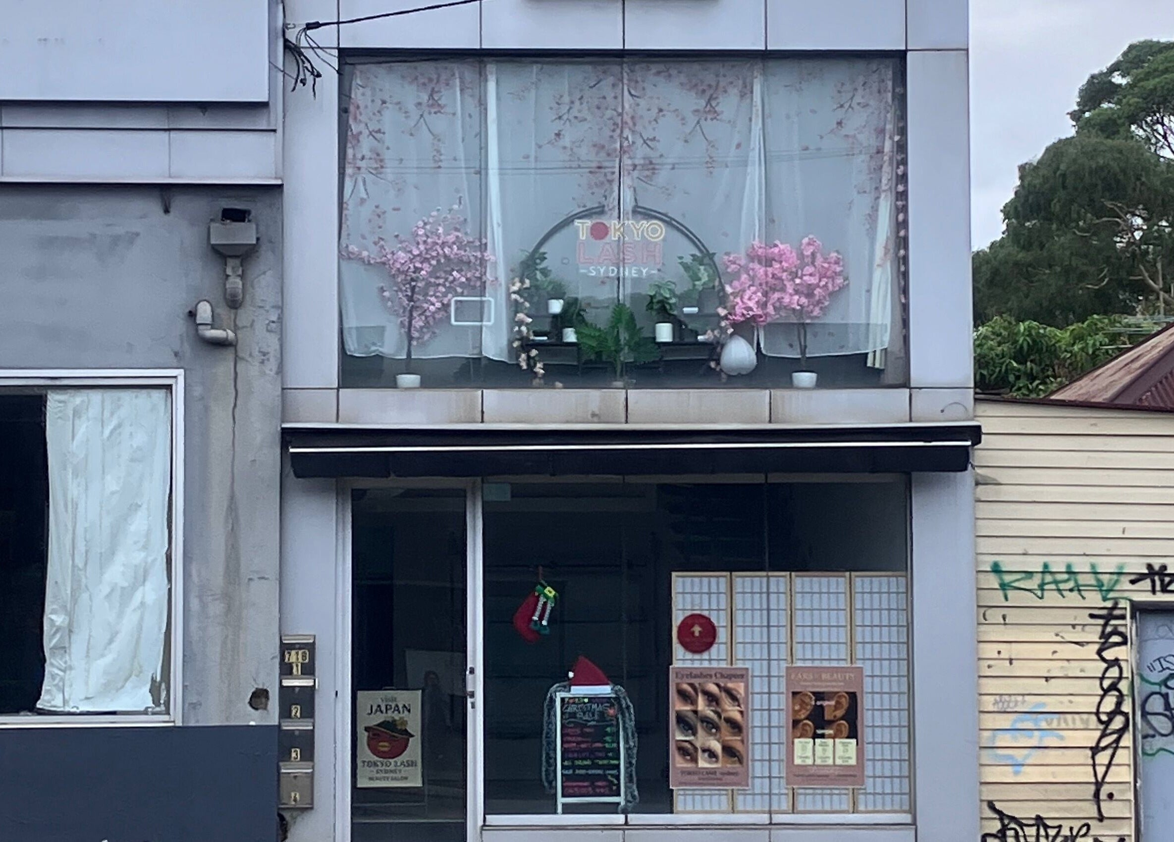 Front view of TOKYO LASH in Petersham, New South Wales, AU, featuring elegant floral decor.
