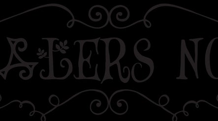 Artistic Healer's Nook Lacombe sign with elegant design, located in Lacombe, Alberta, CA.
