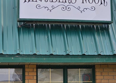 Exterior view of Healer's Nook Lacombe in Lacombe, Alberta, CA, featuring its inviting sign.