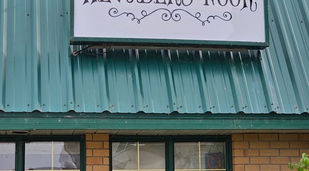 Exterior view of Healer's Nook Lacombe in Lacombe, Alberta, CA, featuring its inviting sign.