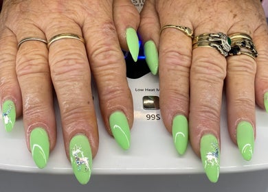 Bright lime green nails with detailed art at Regz Boutique, Kawerau, Bay Of Plenty Region, NZ.