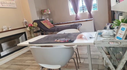 Inviting interior of Nails By Riska ° Hair by Megs in Potchefstroom, North West, ZA with a treatment table.