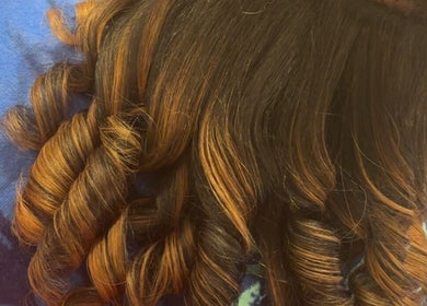 Beautifully styled curls at IvyBeautyBar2 in Darien, Illinois, US. Enhance your look with expert hair services.